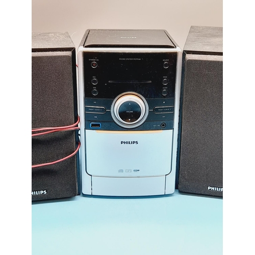 600 - Philips MCM166 Micro System CD/Radio with Speakers. Powers Up.