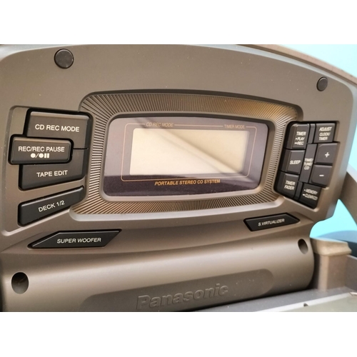 648 - Panasonic RX-ED707 Portable Stereo CD/Cassette Player. Powers Up. W/O but Requires Attention.