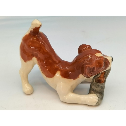 116 - Beswick Figure of Dog with Slipper. 11cm x 9cm.