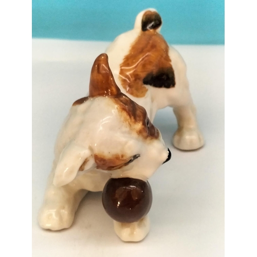 130 - Royal Doulton Figure of Dog with Ball HN 1103. 12cm x 8cm. Seconds Quality.