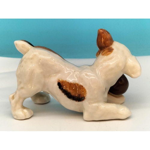 130 - Royal Doulton Figure of Dog with Ball HN 1103. 12cm x 8cm. Seconds Quality.