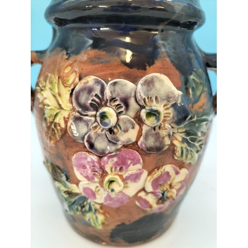 192 - Longpark Pottery (Torquay Ware) Twin Handled 19cm Vase with Floral Decoration.