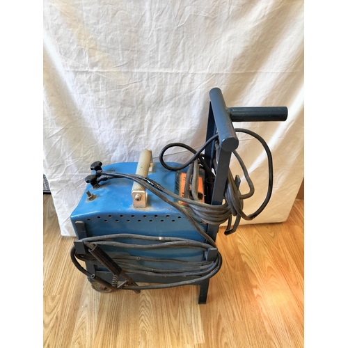 381 - Oil Filled Arc Welder on Two Wheel Frame plus 2 x Welding Clamps. 61cm High, 43cm x 26cm. Collection... 