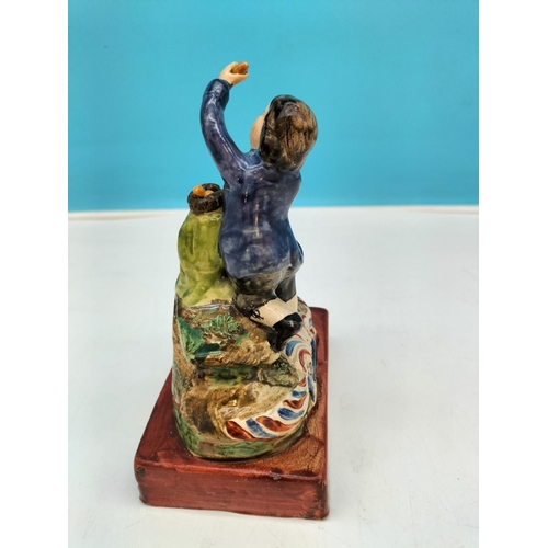 400 - Early Staffordshire c1780-1820 Pearlware Figure of a Boy Stealing Eggs. 16cm Tall.