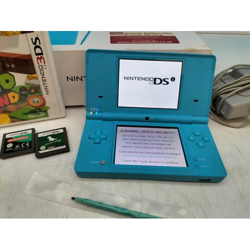 438 - Boxed Nintendo DSi Game System with 4 x Games W/O.