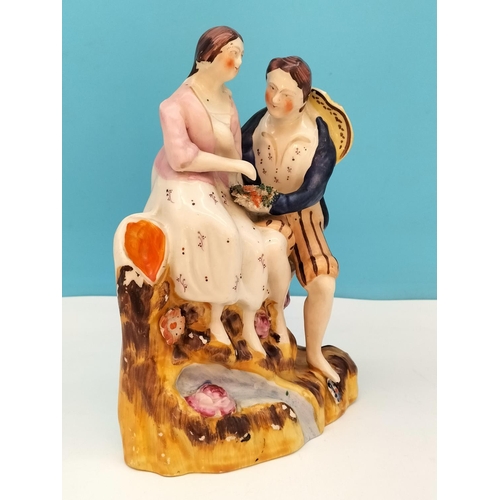 57 - Early Staffordshire c 1860-1900 Pottery Figure 'Paul and Virginia'. 22cm Tall. Some Paint Flakes.