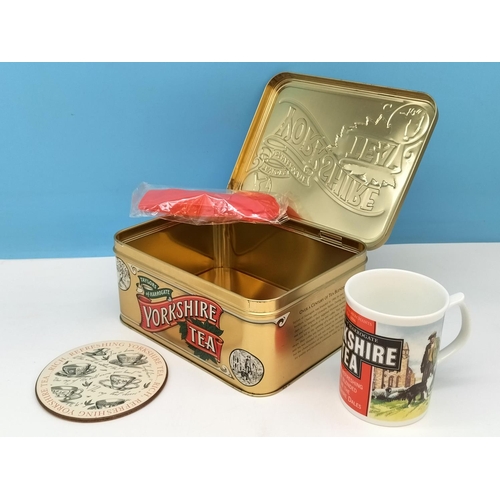 127 - Taylors of Harrogate 'Yorkshire Tea' Tin with Mug, etc plus 2 x Sealed Jigsaws (2) from the Yorkshir... 