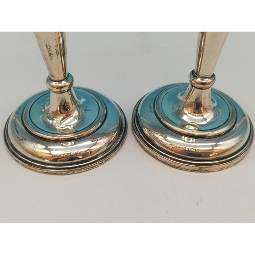 77 - Pair of Silver Hallmarked (Birmingham 1911) Candlesticks. Possibly by Sydney & Co. 15cm Tall.