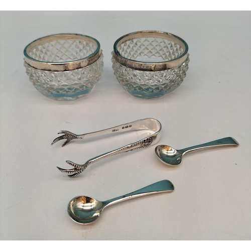 79 - Silver Hallmarked Claw Sugar Tongs plus 2 x Silver Rimmed Salts with Hallmarked Spoons.