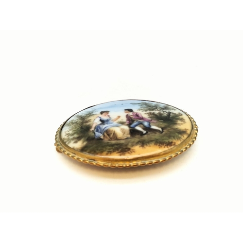 315 - Vintage Hand Painted Porcelain Brooch in Gilt Metal Frame. 6cm x 5cm.