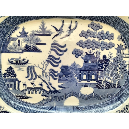 409 - 19th Century Blue and White 'Willow' Pattern Large Meat Platter. Unmarked c 1860-1880.  49cm x 39cm.