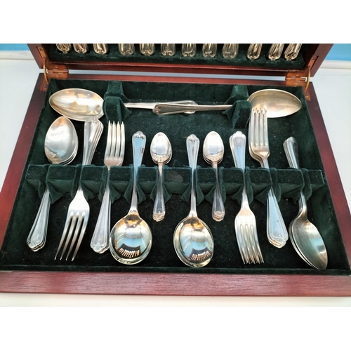 412 - Wooden Cased 44 Piece, 6 Setting Canteen of Cutlery with Oyster Design Handles.