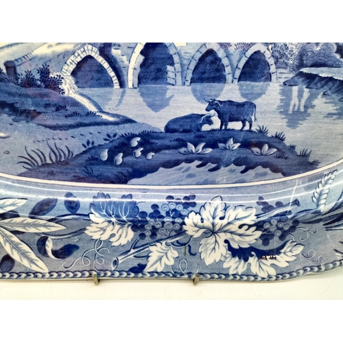 53 - Large 19th Century Blue and White Meat Platter Decorated with the Bridge of Lucano Pattern. Printed ... 