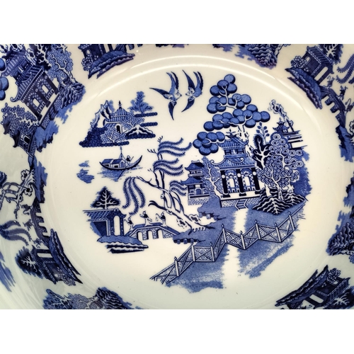 152 - Coalport 'Willow' Pattern Bowl. 11cm High, 26cm Diameter.