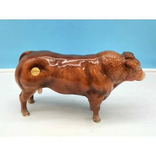 169 - John Beswick Figure of a Bull. 14cm High x 24cm Long.