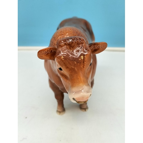 169 - John Beswick Figure of a Bull. 14cm High x 24cm Long.