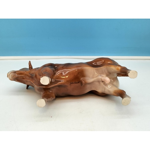 169 - John Beswick Figure of a Bull. 14cm High x 24cm Long.