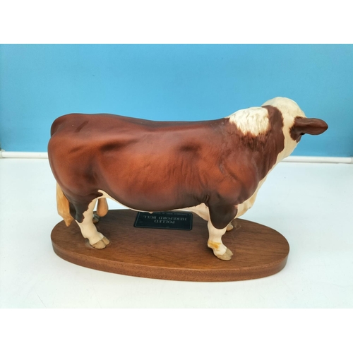 183 - Beswick Figure of a Polled Hereford Bull on Plinth. 18cm High x 29cm.