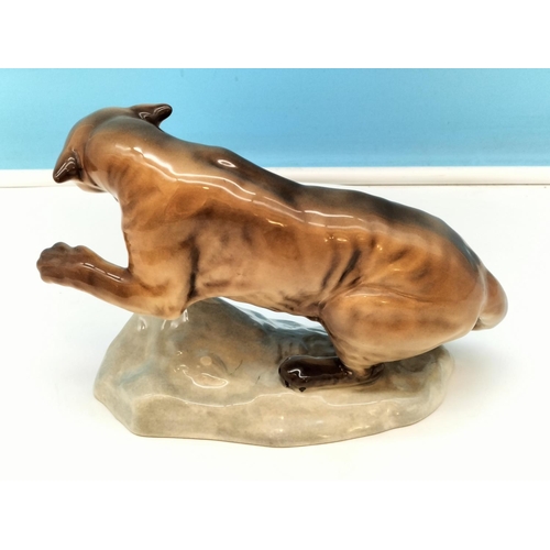 184 - Beswick Gloss Figure of a Puma on a Rock. Model 1823. 14cm High x 20cm.