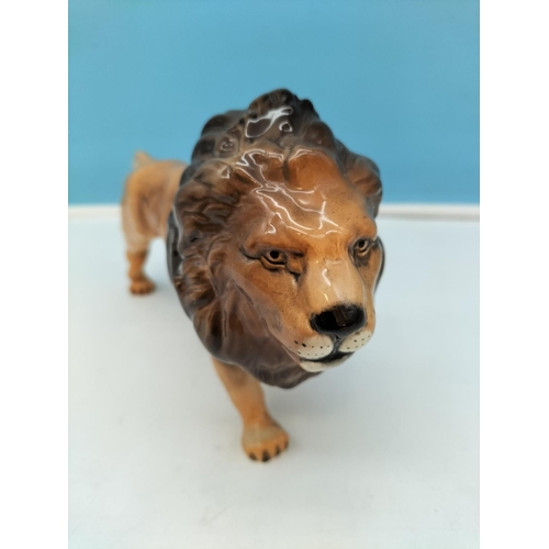 227 - Beswick Figure of a Lion 12cm High x 24cm.