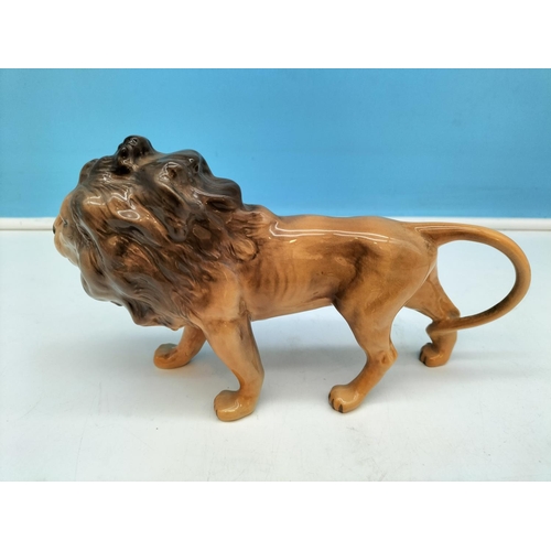 227 - Beswick Figure of a Lion 12cm High x 24cm.