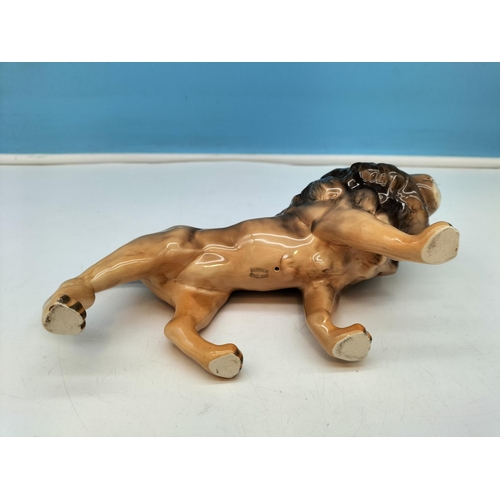 227 - Beswick Figure of a Lion 12cm High x 24cm.