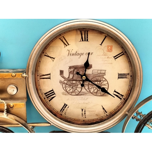 338 - Tin Plate Car Wall Clock. 50cm x 30cm. Not Working.