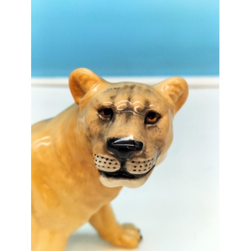 464 - Beswick Figure of a Lioness. 13cm High, 20cm Long.