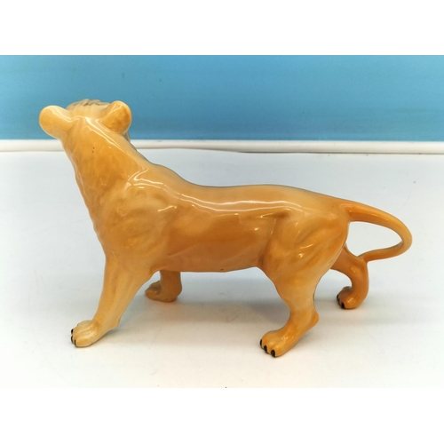 464 - Beswick Figure of a Lioness. 13cm High, 20cm Long.