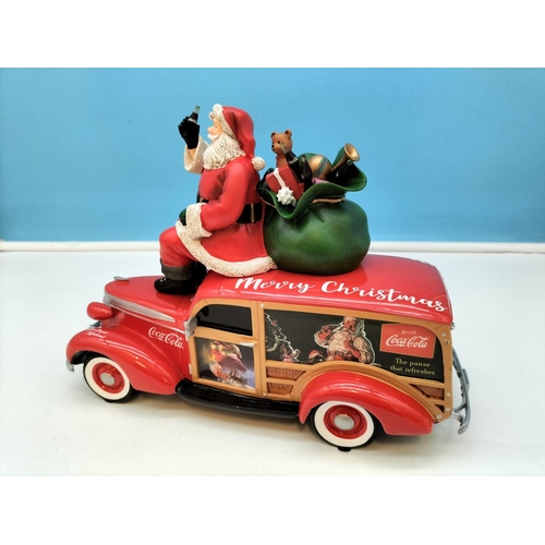 465 - Limited Edition Coca-Cola Christmas Woody Wagon. 20cm high x 25cm.