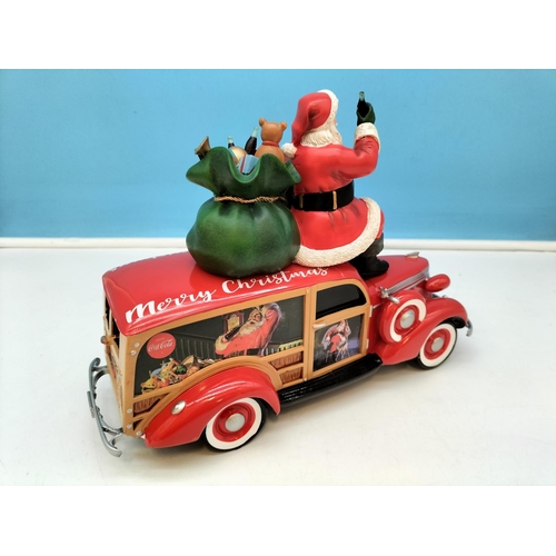 465 - Limited Edition Coca-Cola Christmas Woody Wagon. 20cm high x 25cm.