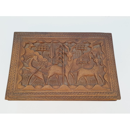 479 - Hand Carved Wooden Animal Panel Box. 7cm High, 25cm x 16cm.