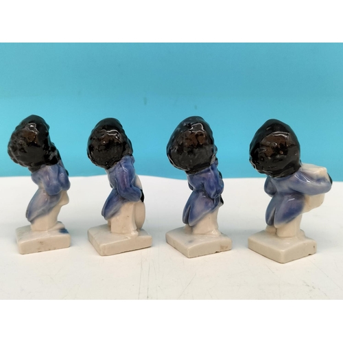 158 - Wade Robertson's Golly Band Players (4). Tallest 6cm. Slight Loss to Glaze on 1.