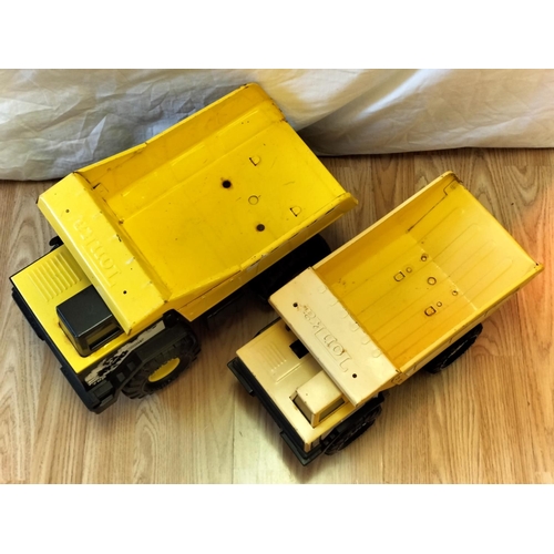 446 - 2 x Tonka Dumper Trucks. 26cm High, 43cm x 20cm.