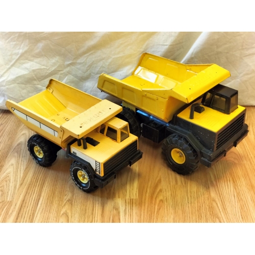 446 - 2 x Tonka Dumper Trucks. 26cm High, 43cm x 20cm.