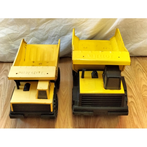 446 - 2 x Tonka Dumper Trucks. 26cm High, 43cm x 20cm.