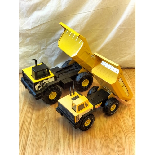 446 - 2 x Tonka Dumper Trucks. 26cm High, 43cm x 20cm.