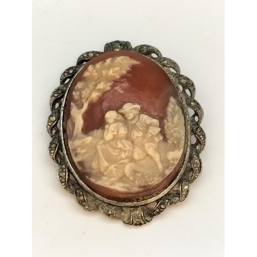 132 - Vintage Carved Shell Cameo Brooch in a White Metal Marcasite Frame c1920.