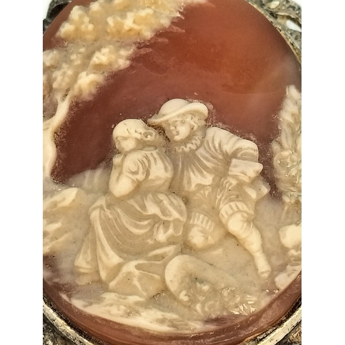 132 - Vintage Carved Shell Cameo Brooch in a White Metal Marcasite Frame c1920.