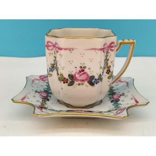 256 - Jacques Dumont (Limoges) Porcelain Hand Painted Cup and Saucer with Floral Garland Decoration c1911.