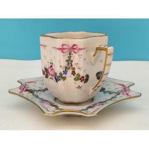 256 - Jacques Dumont (Limoges) Porcelain Hand Painted Cup and Saucer with Floral Garland Decoration c1911.