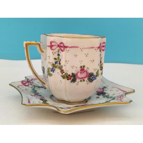 256 - Jacques Dumont (Limoges) Porcelain Hand Painted Cup and Saucer with Floral Garland Decoration c1911.