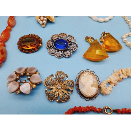 395 - Collection of Mixed Costume Jewellery to include Necklaces and Brooches.