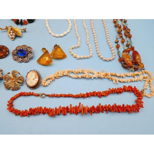 395 - Collection of Mixed Costume Jewellery to include Necklaces and Brooches.