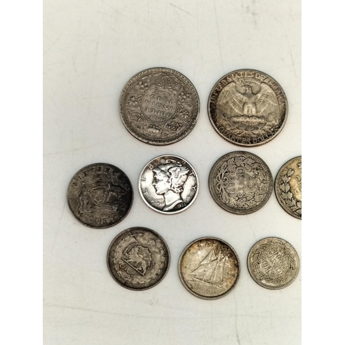 416 - Collection of Silver World Coins. Total Weight 39.4 Grams.