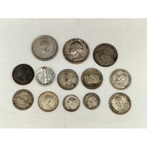 416 - Collection of Silver World Coins. Total Weight 39.4 Grams.