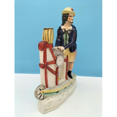 105 - Rare c 1860 Staffordshire 26cm Figure 'The Knife Grinder'. Different Colourway.