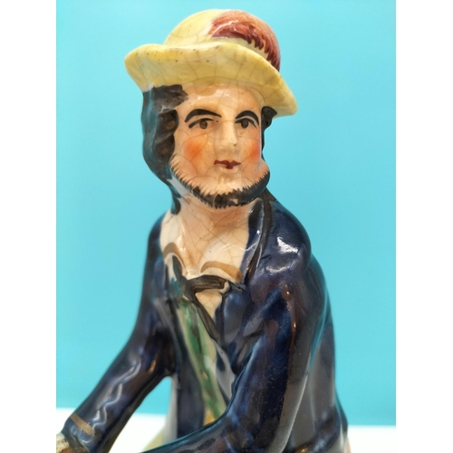 105 - Rare c 1860 Staffordshire 26cm Figure 'The Knife Grinder'. Different Colourway.