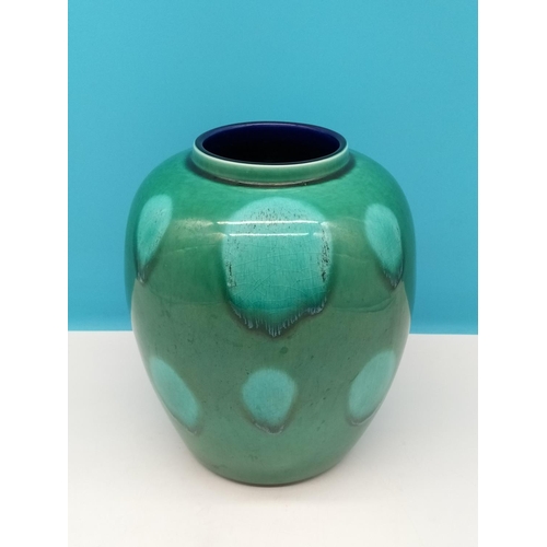 143 - Poole Pottery Green 23cm Vase.