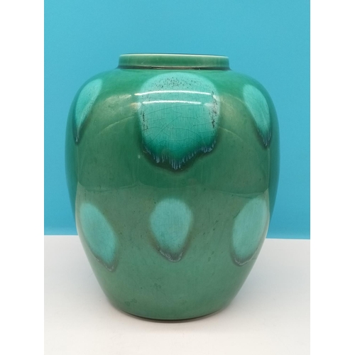 143 - Poole Pottery Green 23cm Vase.